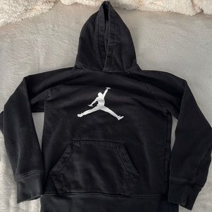 A black Jordan hoodie size large